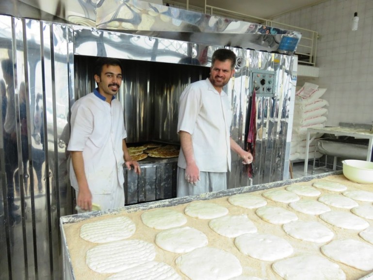 men making Persian bread in Qazvin Iran. Bread is very important in Persian cuisine and part of any Persian breakfast