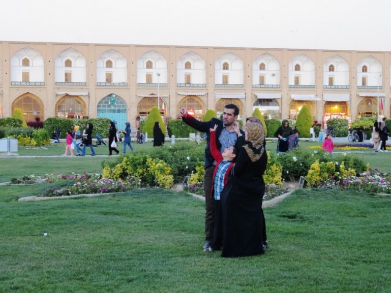 Iranians taking selfies at Naqs-e Jahan square in Isfahan. One of the top tourist attractions in Iran.